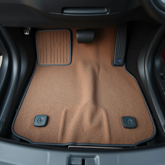 Customized vehicle mats installed in a modern car interior, showing precise coverage and clean edges