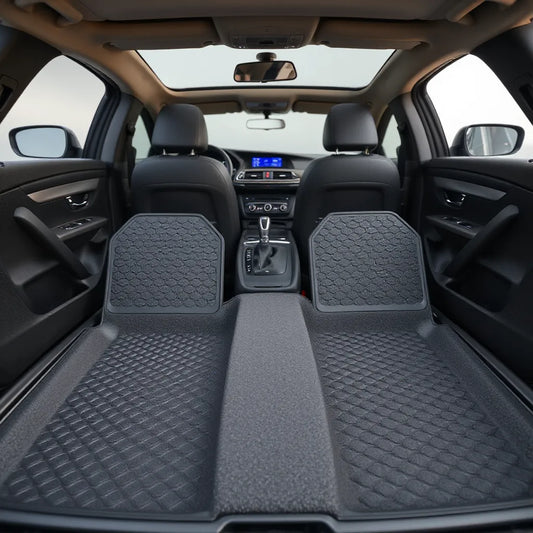 Honeycomb-pattern car floor mats fitted on the driver-side floor with molded edges