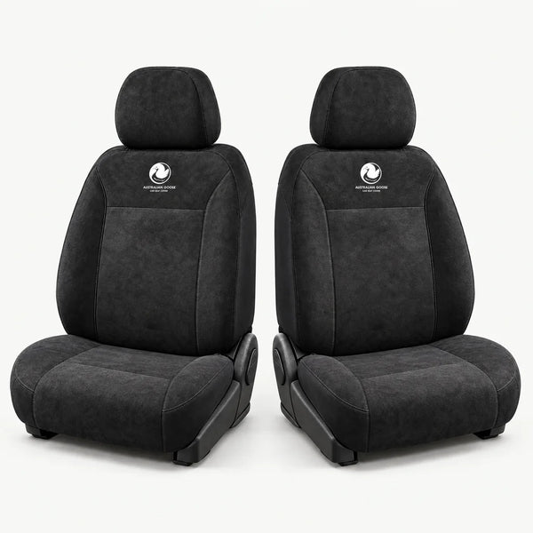 Two matching black Australian Goose front seat covers for driver and passenger, shown side by side on a light studio background