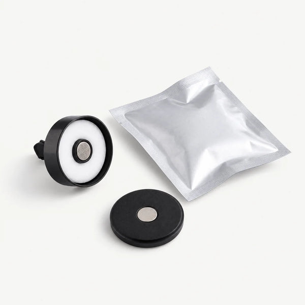 Luxury auto diffuser refill components only, on a clean background