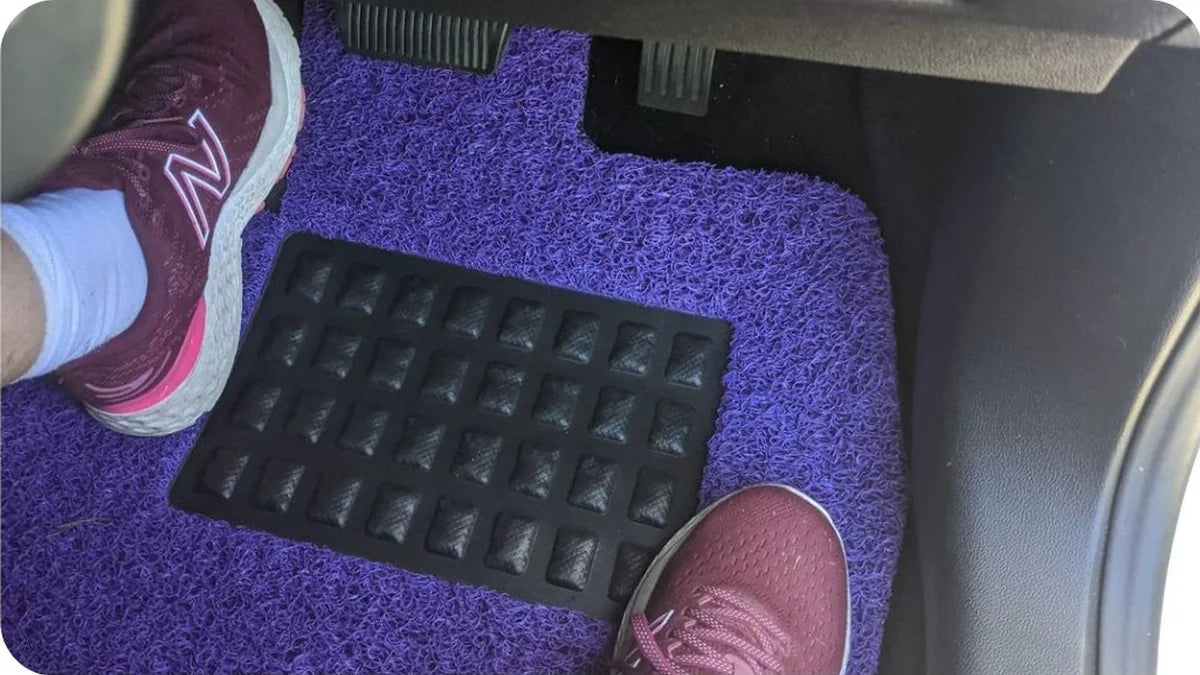 Purple CarMatsCulture mats installed in Janine H.'s Ford Focus